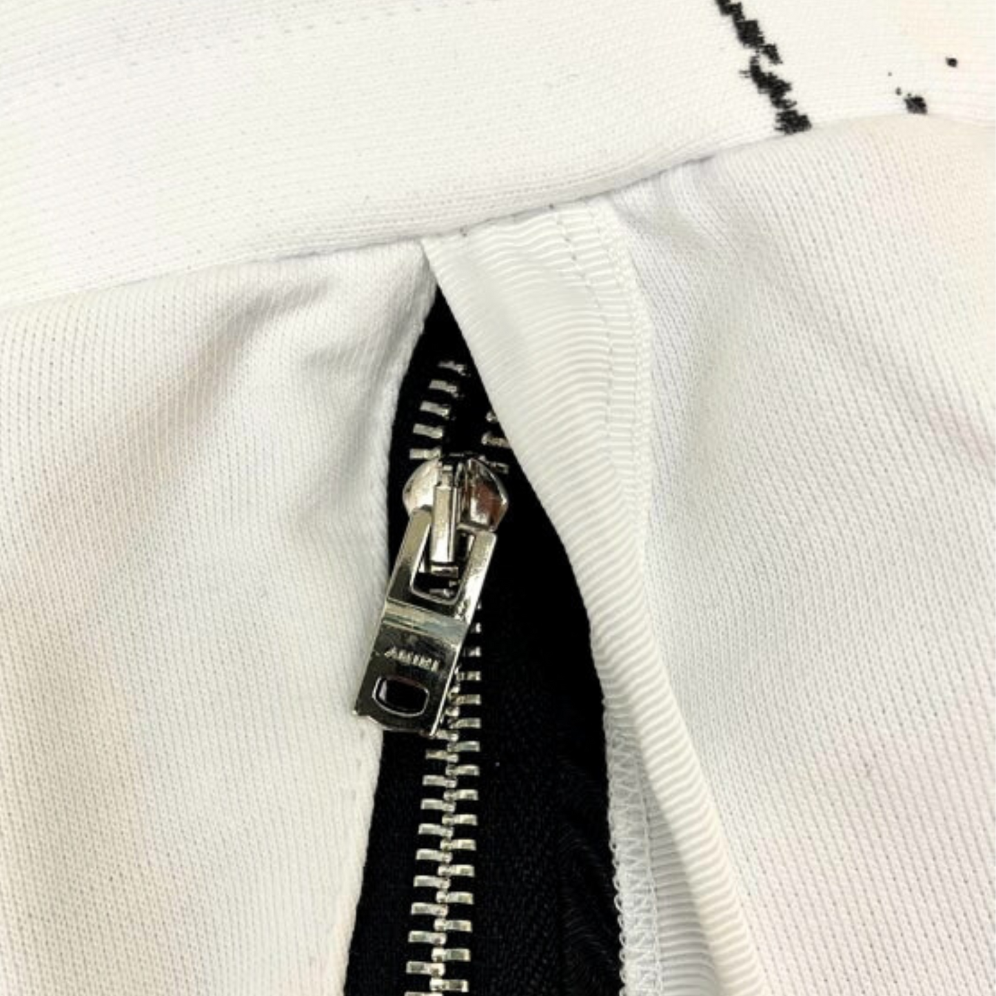 AMIRI White Trousers Cracked Design